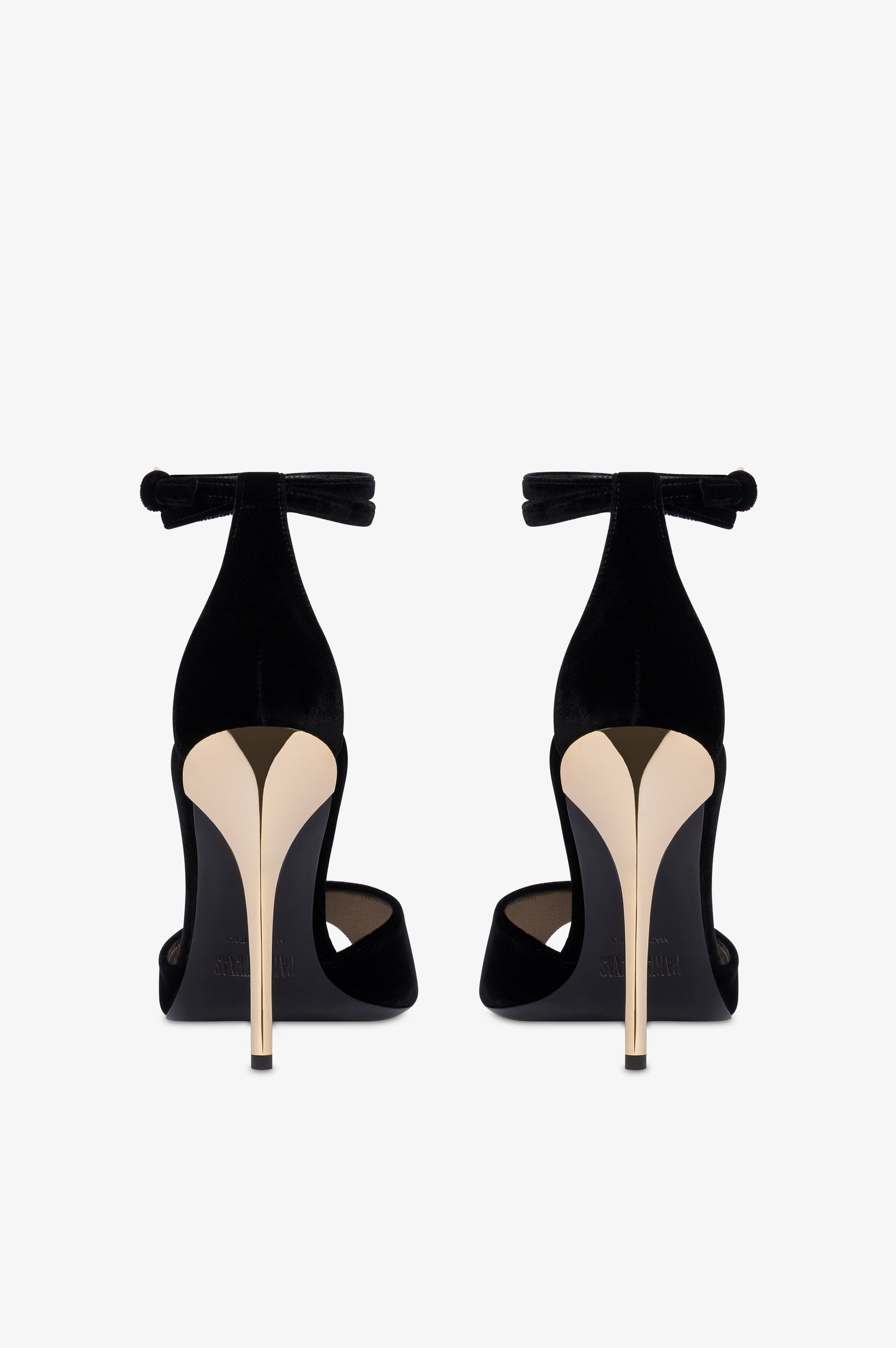 Sandals in black velvet with gold detailing.