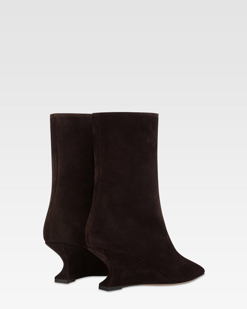 Ankle boots in ebony calf suede leather.