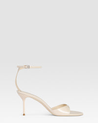 Ankle-strap sandals in black patent leather — IVORY