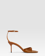Ankle-strap sandals in coffee patent leather