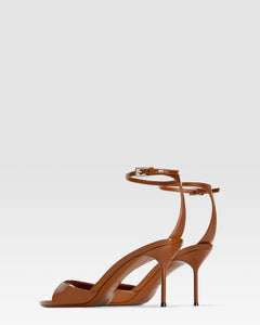 Ankle-strap sandals in coffee patent leather