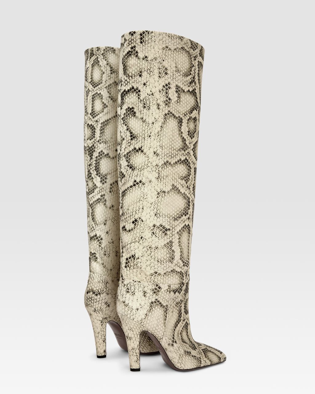Boots in sand printed python leather