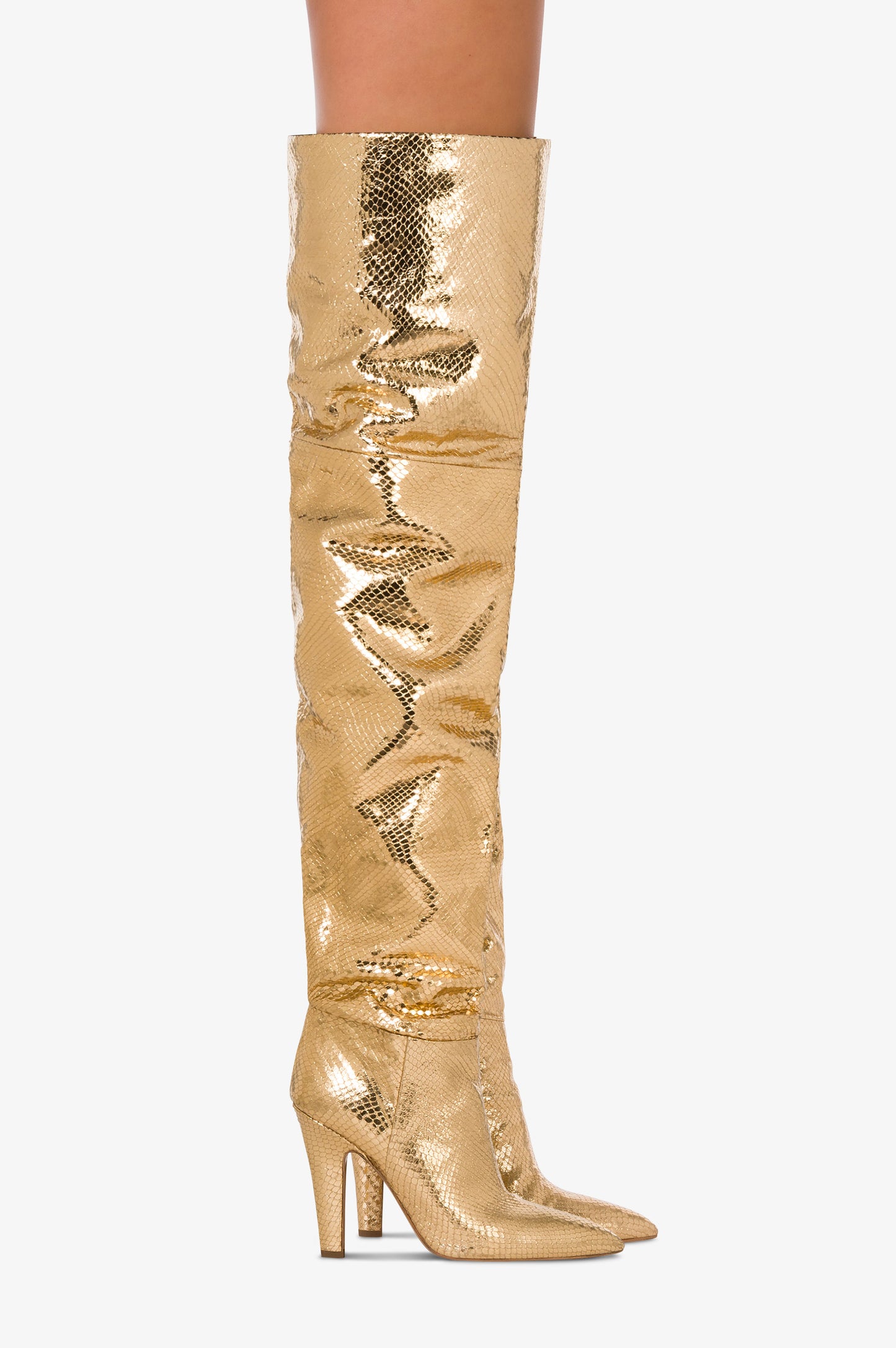 Over-the-knee boots in gold, metallic-effect printed python leather.