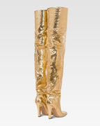 Kniehohe Stiefel aus goldfarbenem, bedrucktem Pythonleder mit Metallic-Effekt.