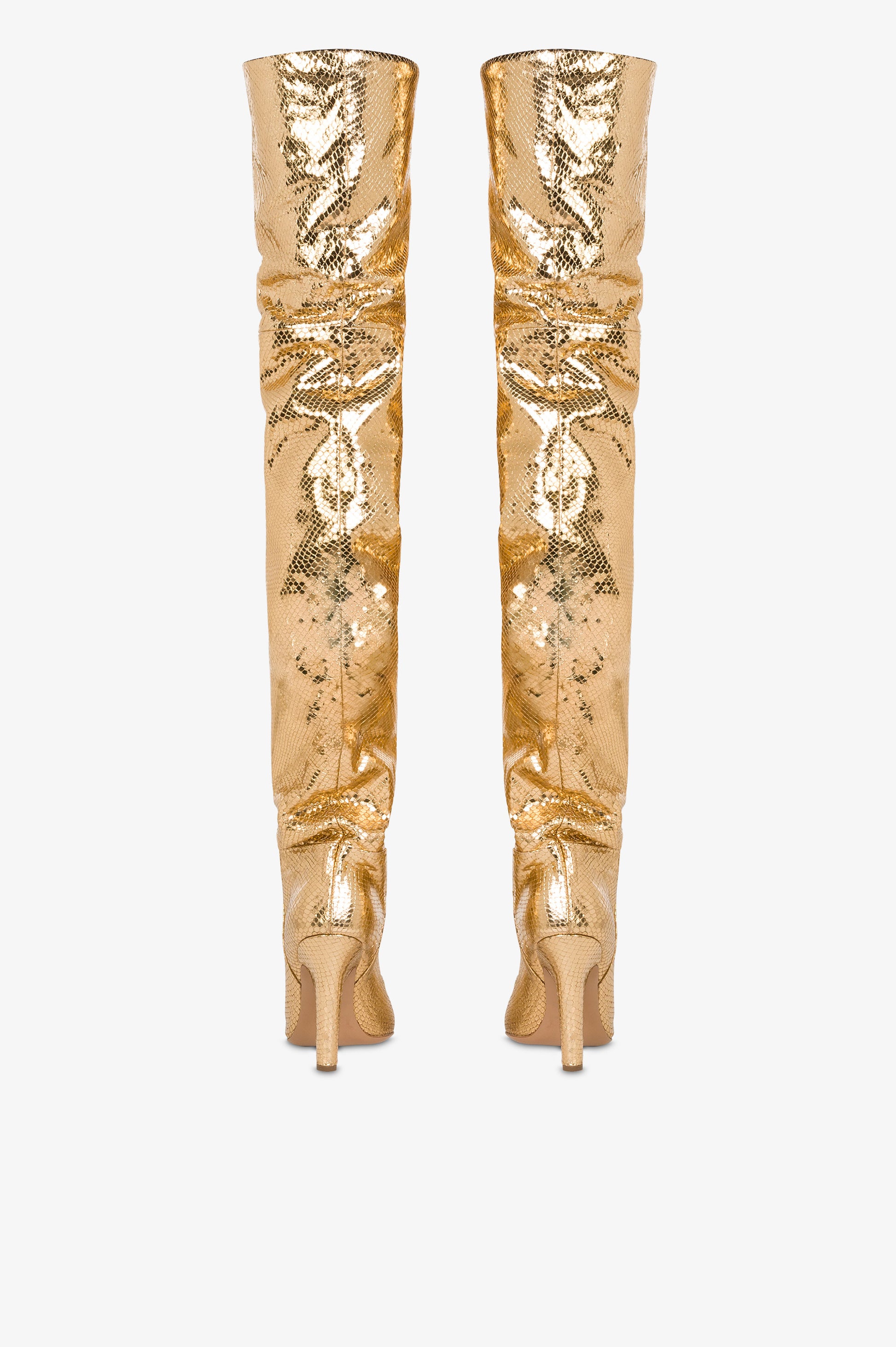 Over-the-knee boots in gold, metallic-effect printed python leather.