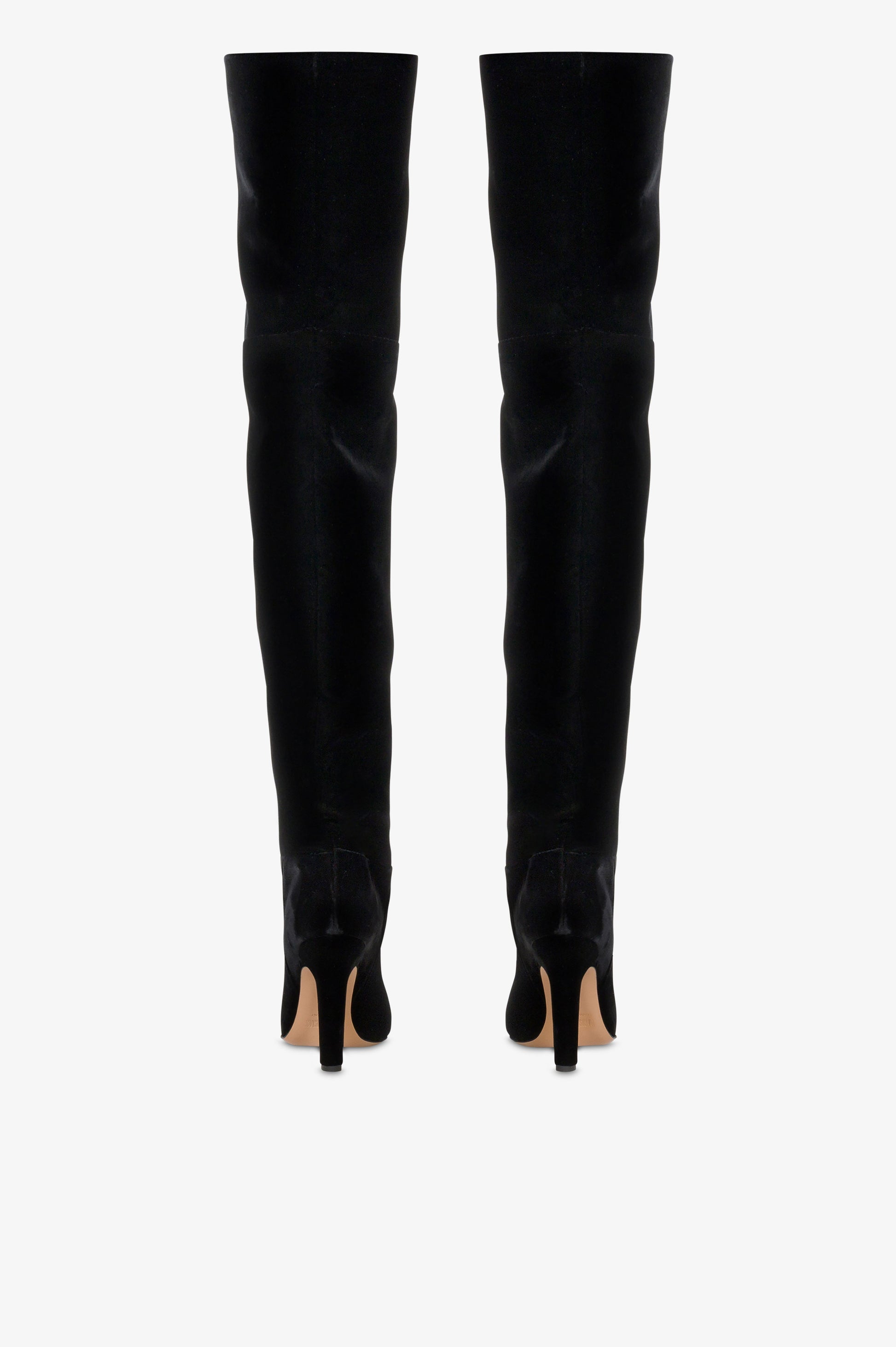 Over-the-knee boots in black velvet.