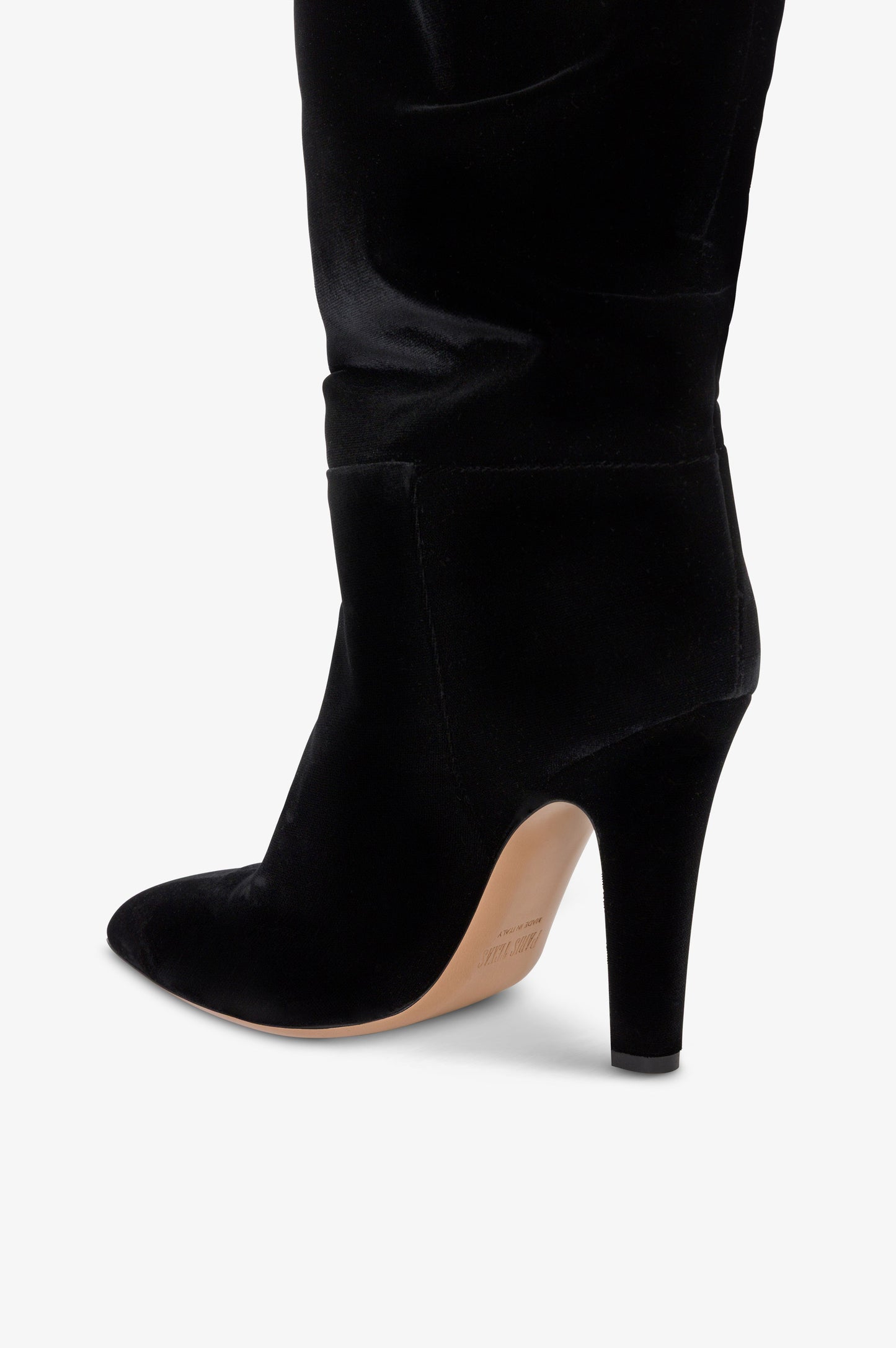 Over-the-knee boots in black velvet.