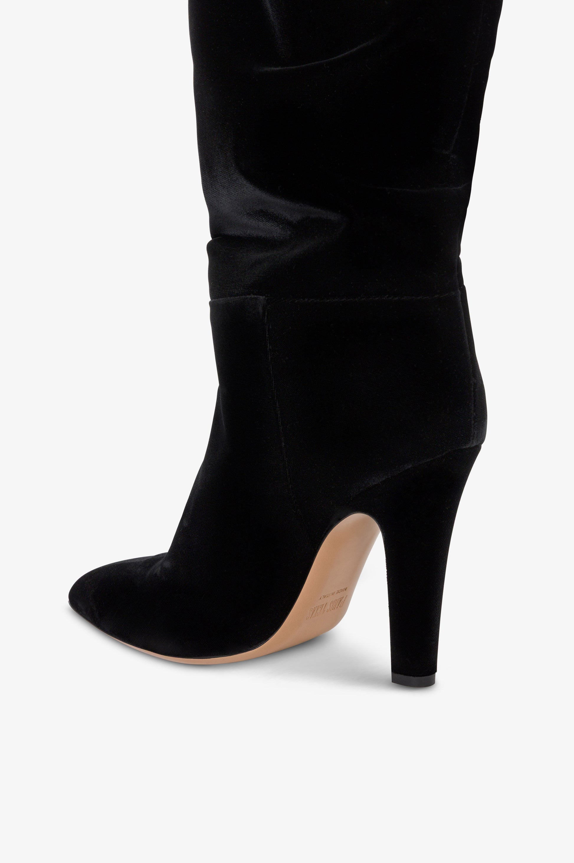 Over-the-knee boots in black velvet.