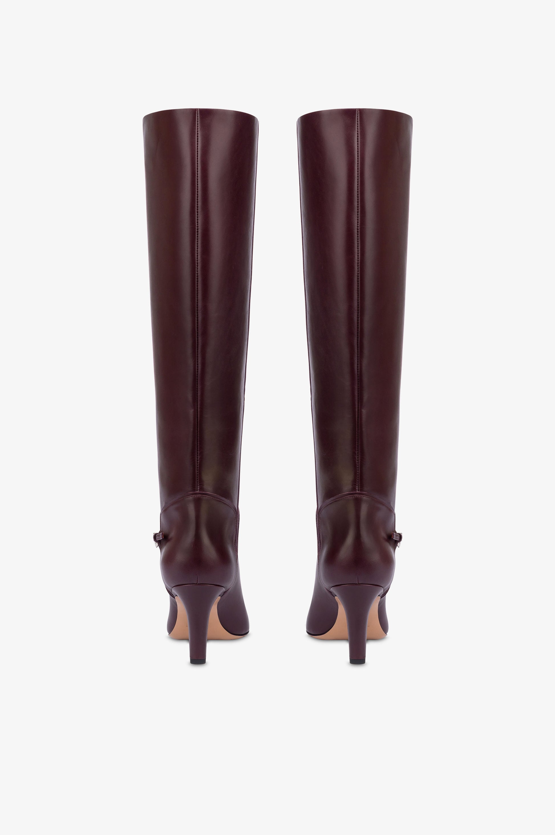 Boots in pinot noir calf leather.