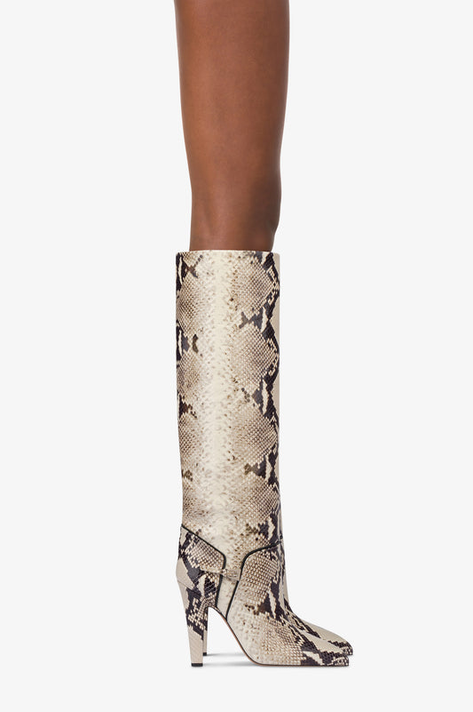Boots in natural printed python leather.