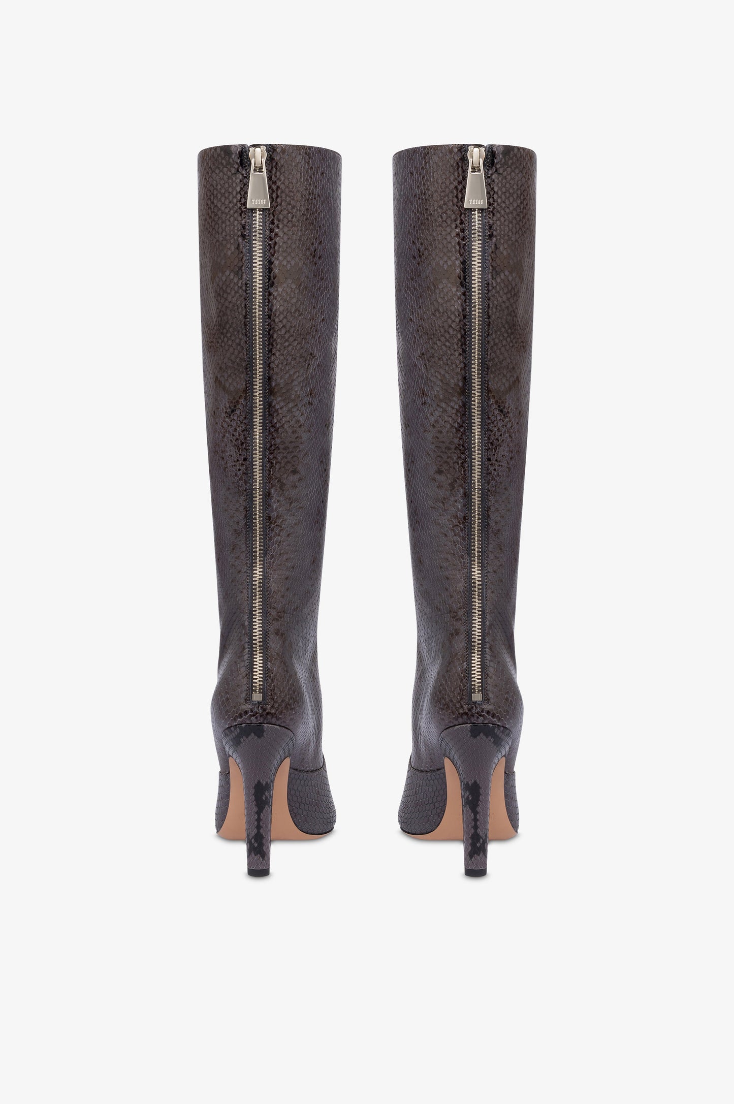 Boots in ash printed python leather.