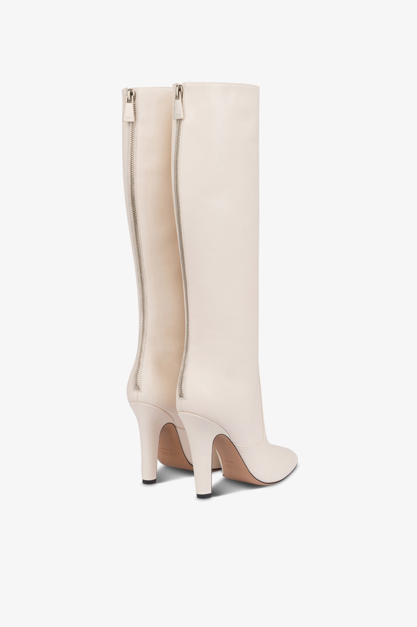 Boots in vanilla calf leather.