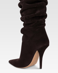 Kniehohe Stiefel aus tiefschwarzem Veloursleder.