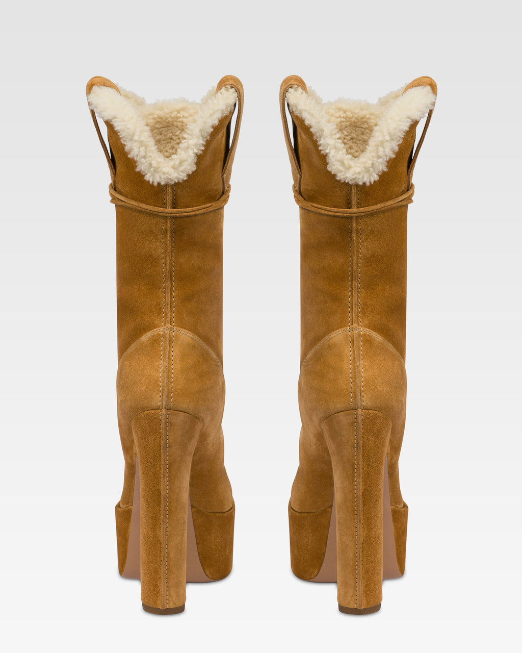 Platform boots in beige calf suede leather.