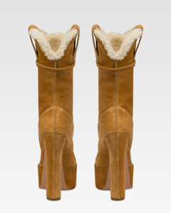 Platform boots in beige calf suede leather.