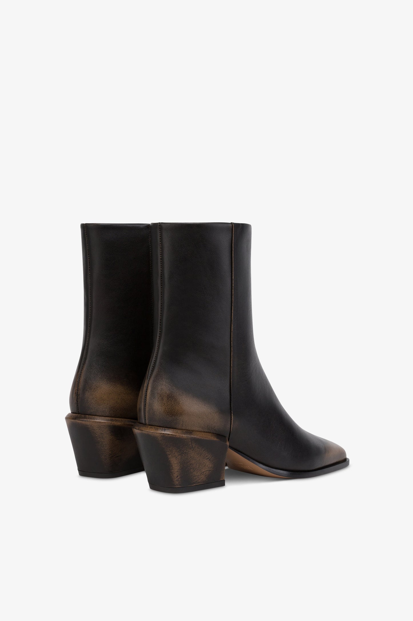 Ankle boots in black brushed leather.