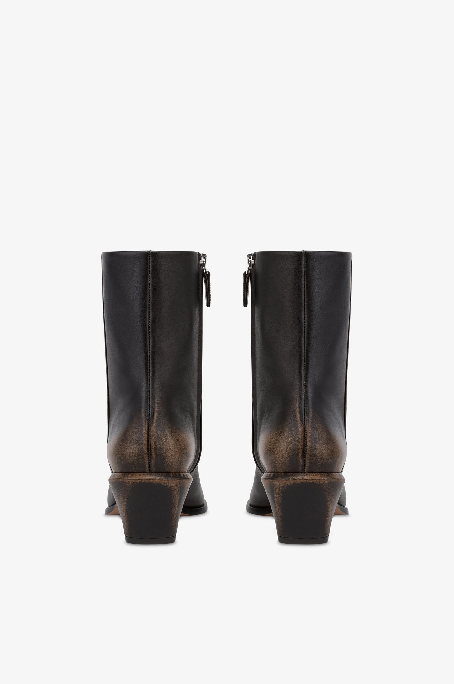 Ankle boots in black brushed leather.