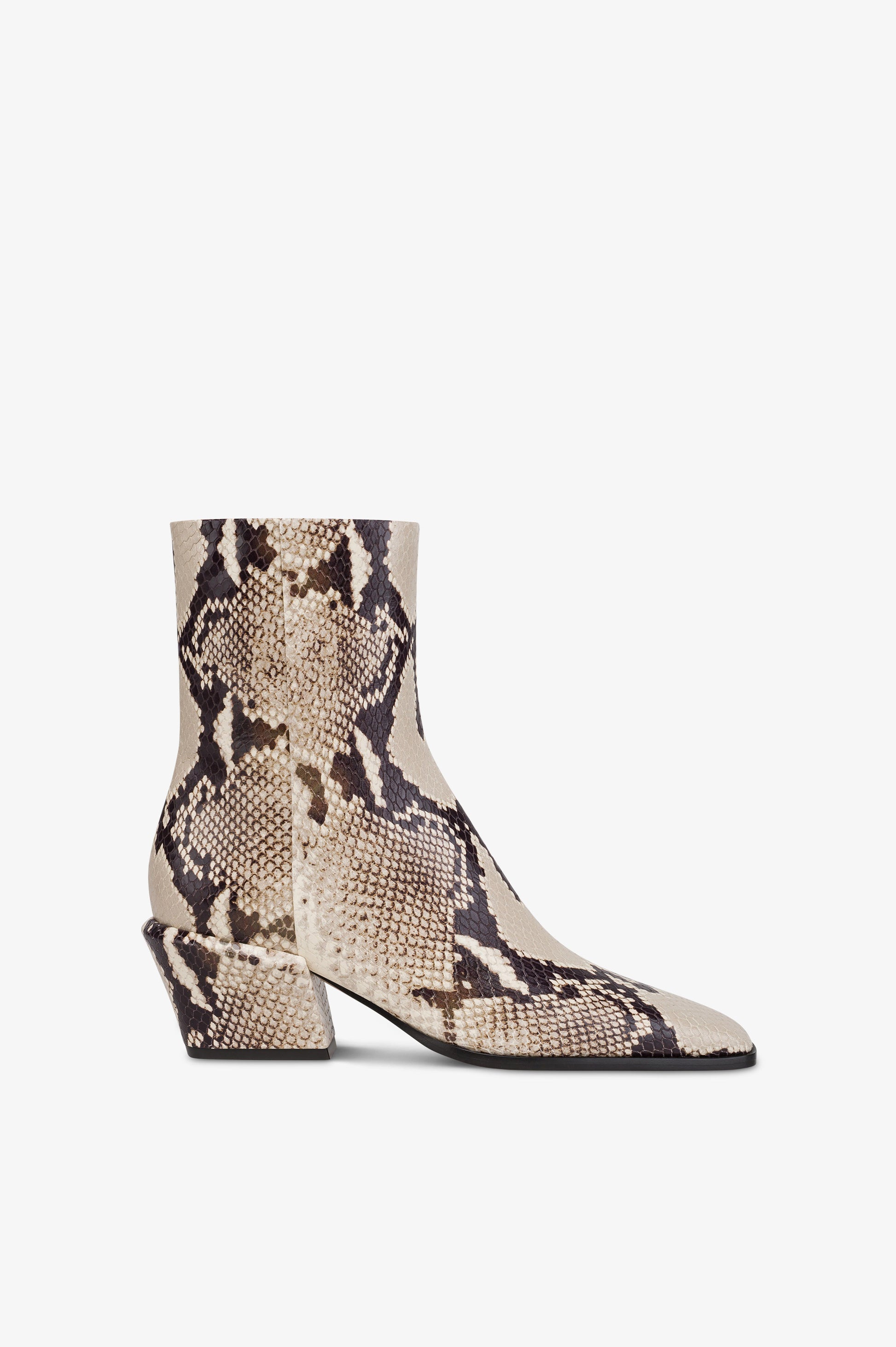 Ankle boots in natural printed python leather.