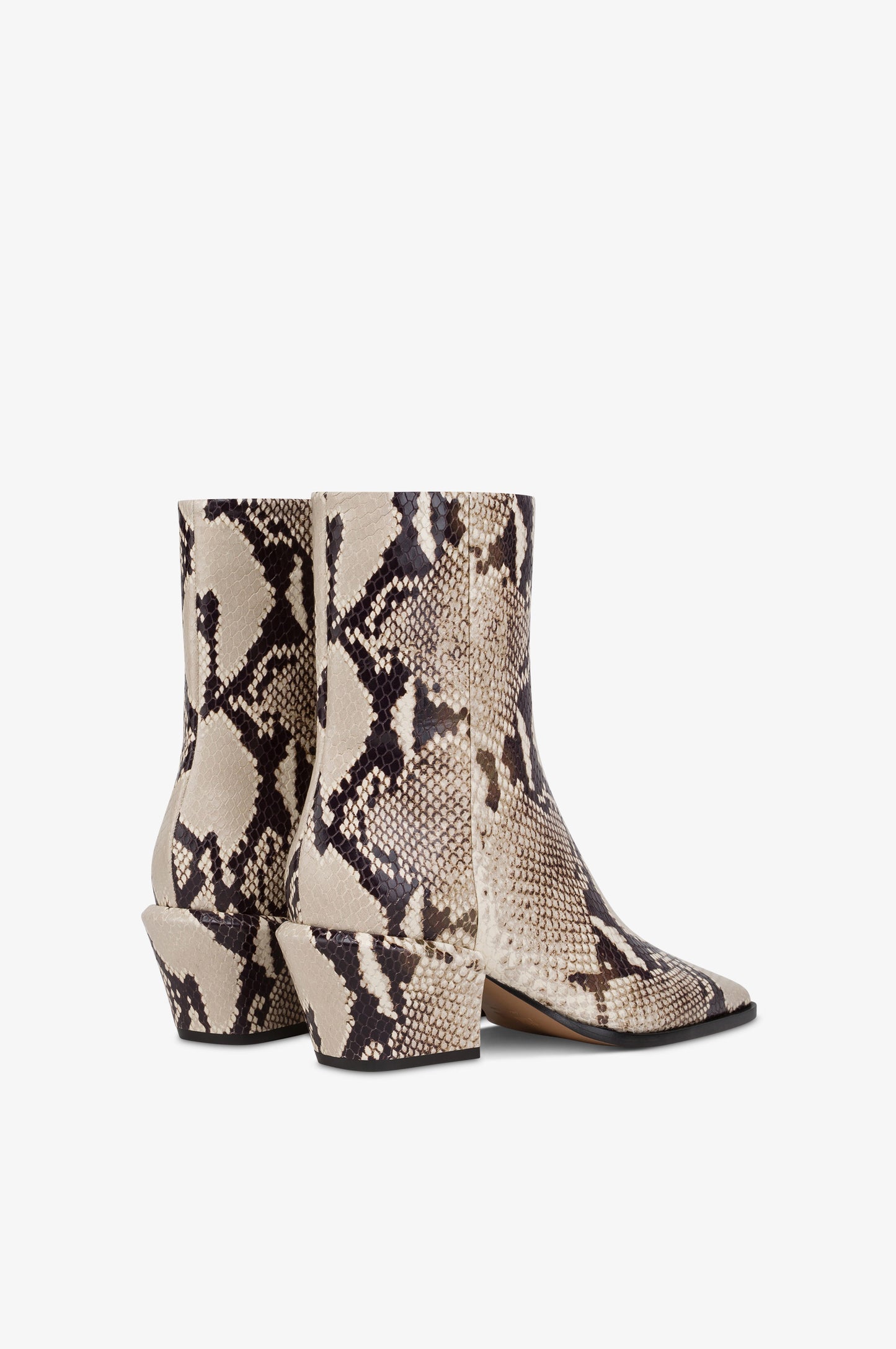 Ankle boots in natural printed python leather.
