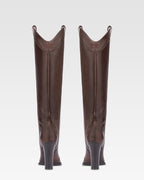 Boots in ebony calf leather.