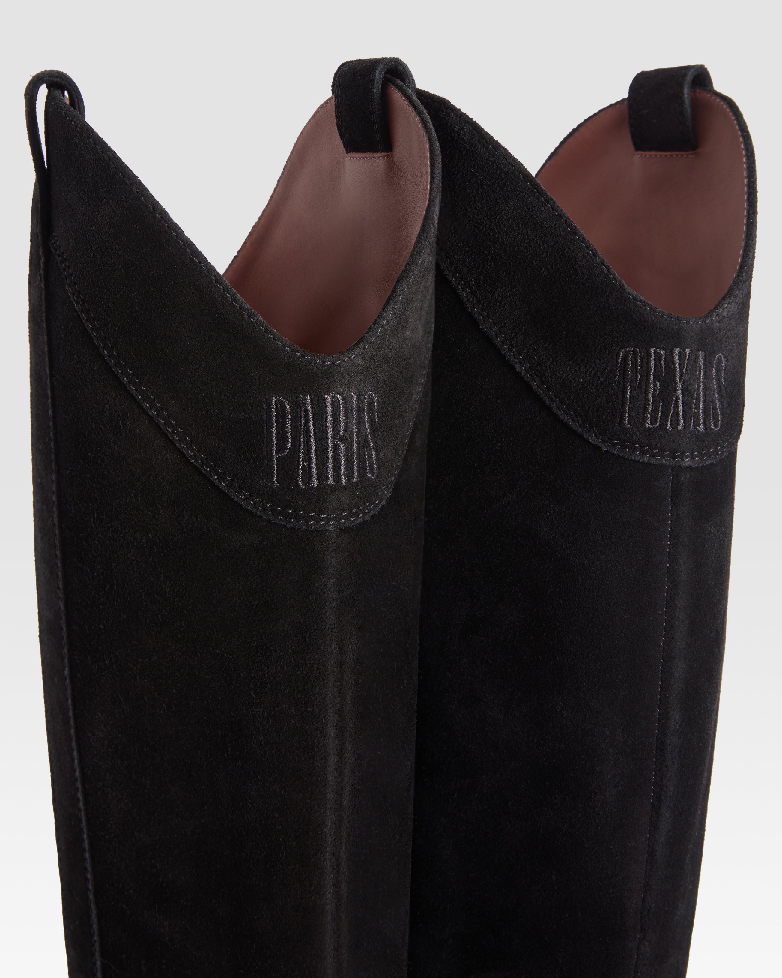 Botas de piel de ante de becerro de color negro