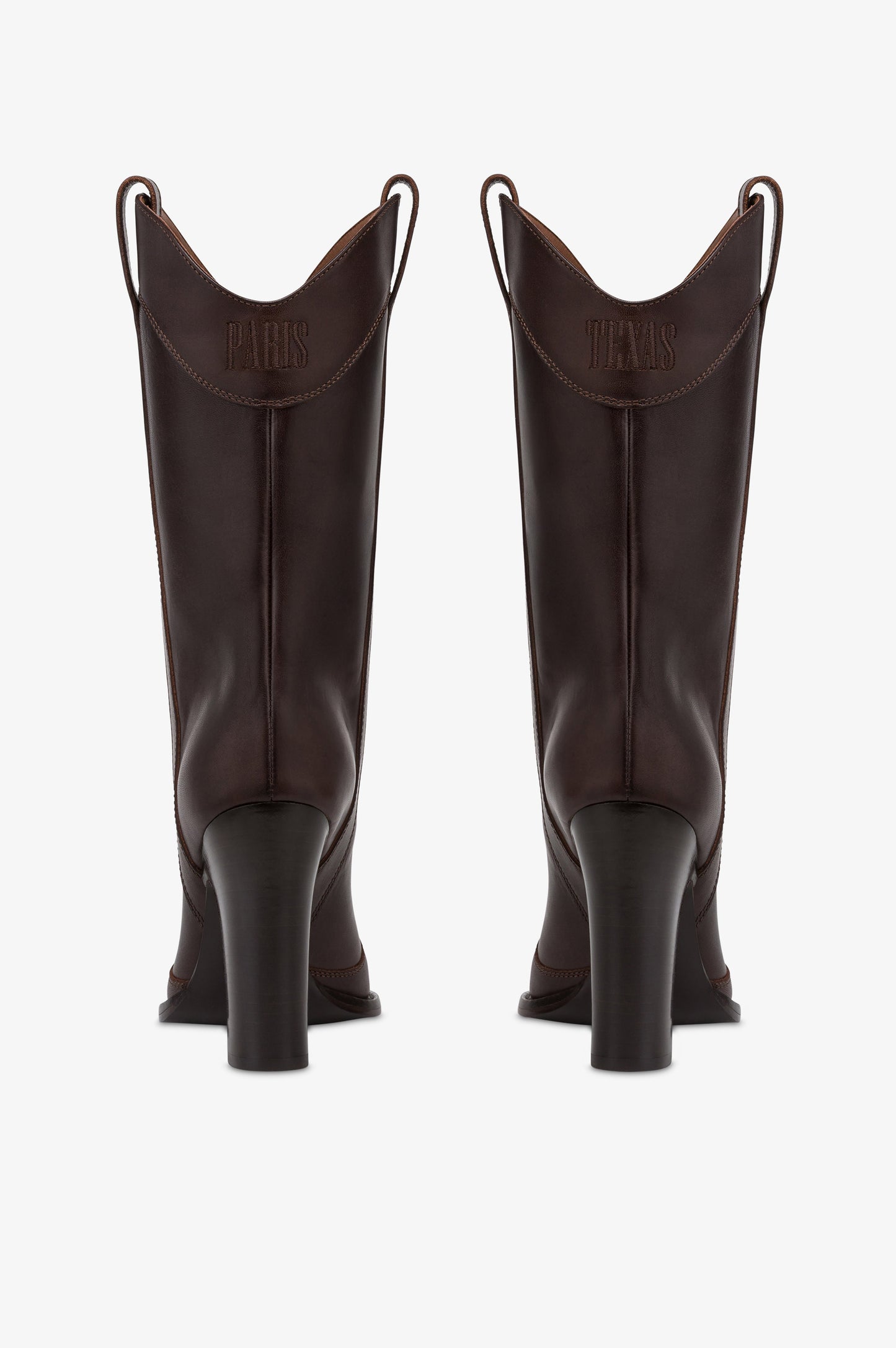 Boots in ebony calf leather.