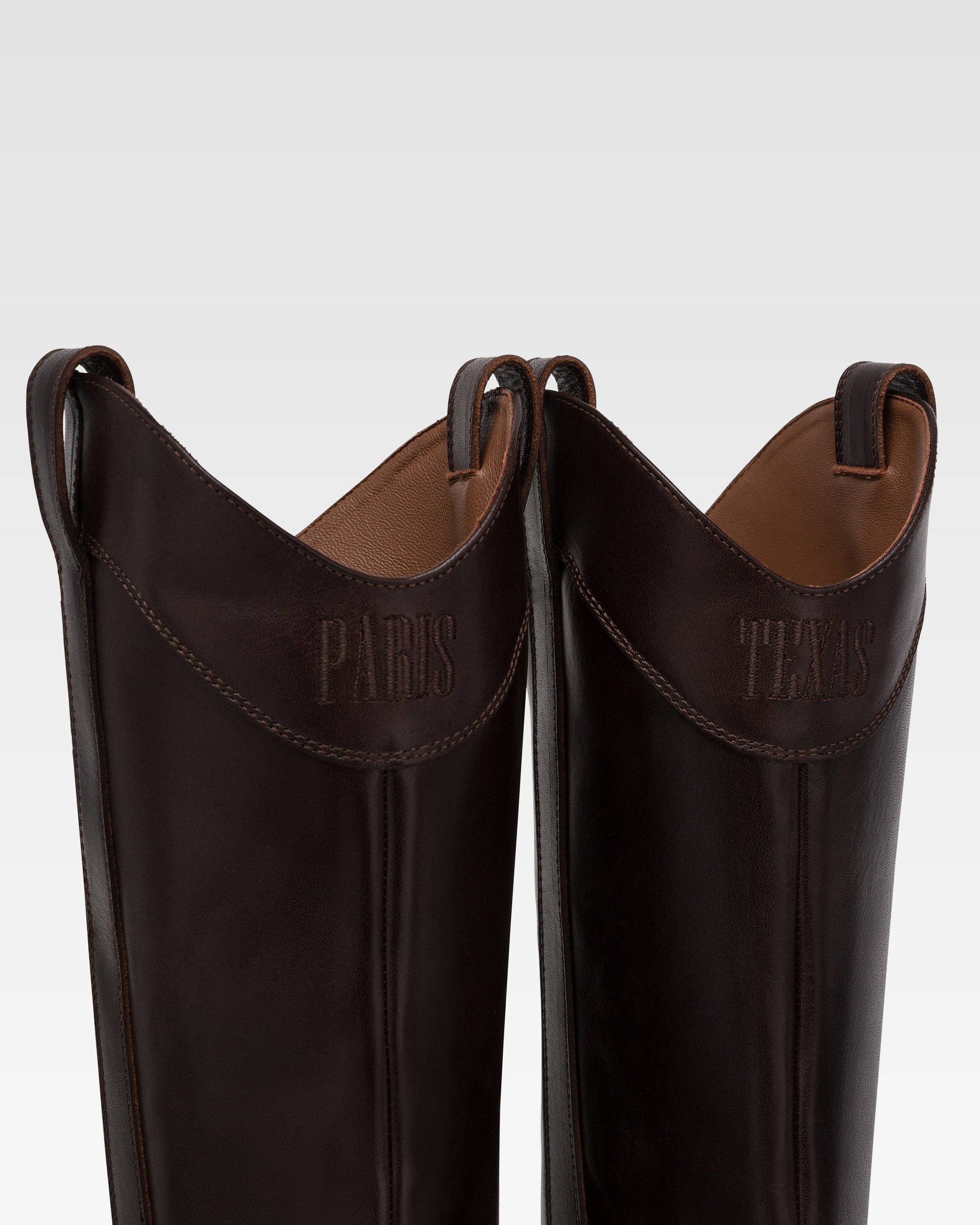 Boots in ebony calf leather. - Paris Texas
