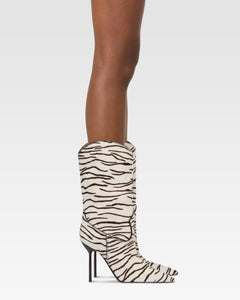 Boots in white and ebony printed cowhide.