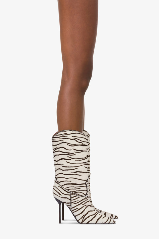 Stiefel aus weissem und tiefschwarzem bedrucktem Rindsleder.