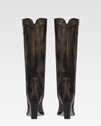 Botas de estilo tejano de piel cepillada de color negro.