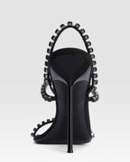 Slingback sandals in black crepe satin with stud detailing