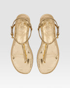 Flache Sandalen aus goldfarbenem Plissee-Leder mit Metallic-Effekt