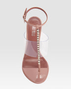T-strap sandals in Texas rose patent leather with stud detailing