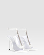 T-strap sandals in optic white patent leather with stud detailing