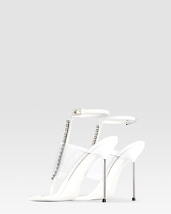 T-strap sandals in optic white patent leather with stud detailing