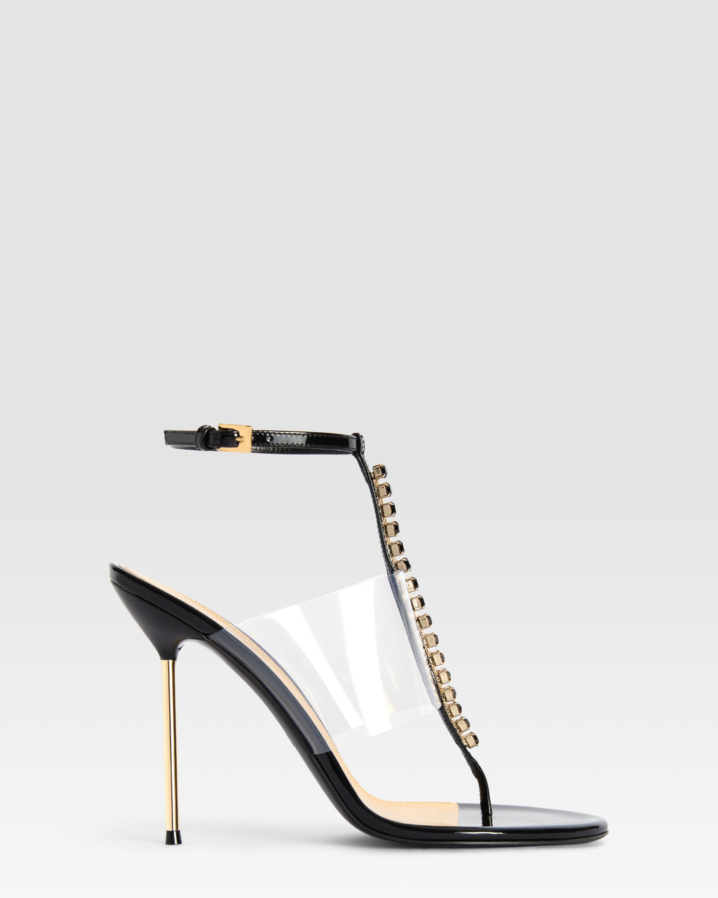 T-strap sandals in black patent leather with stud detailing
