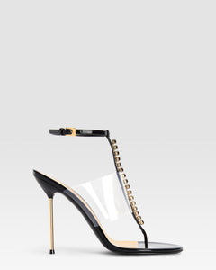 T-strap sandals in black patent leather with stud detailing