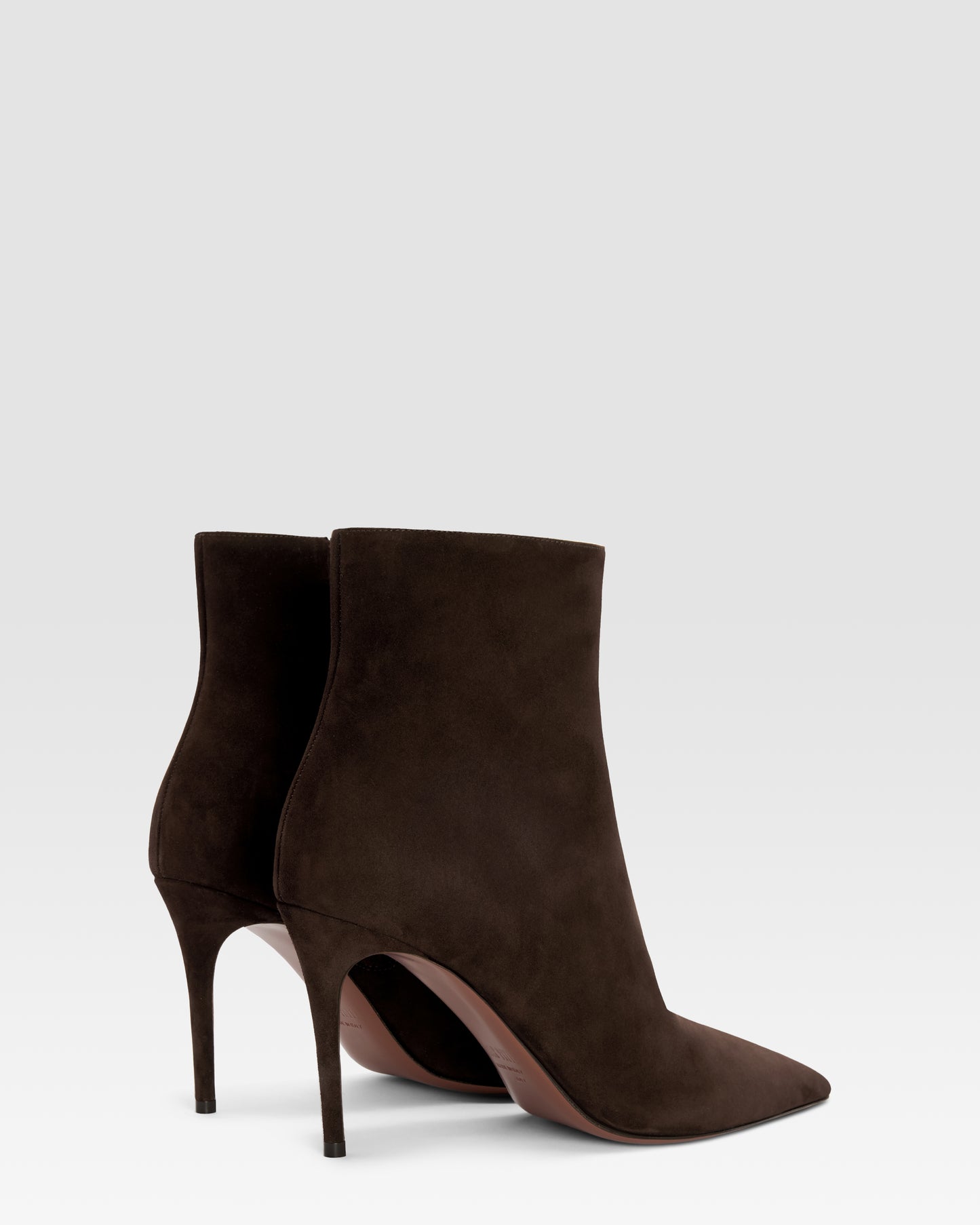 Ankle boots in ebony calf suede leather