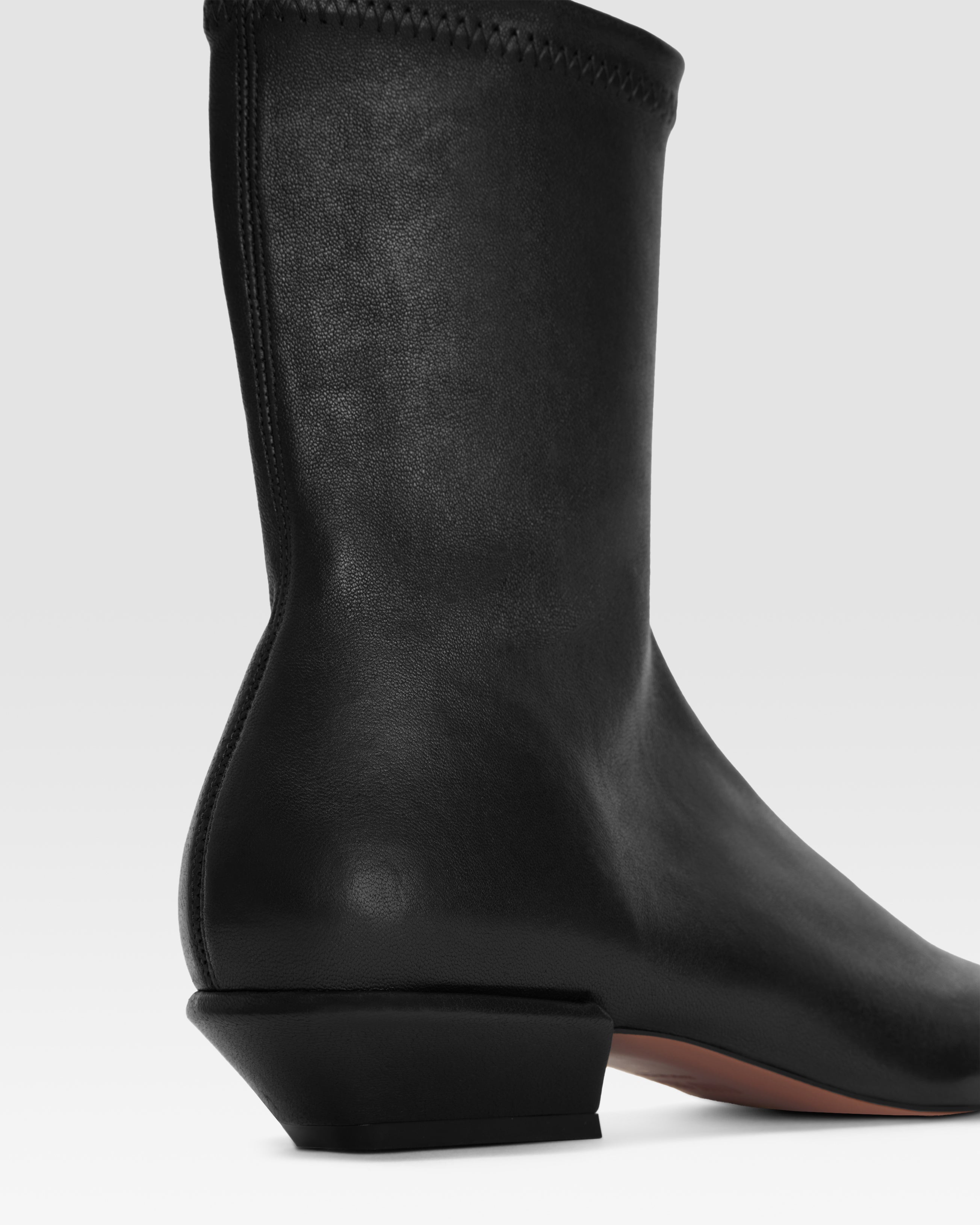 Bottines en cuir stretch noir