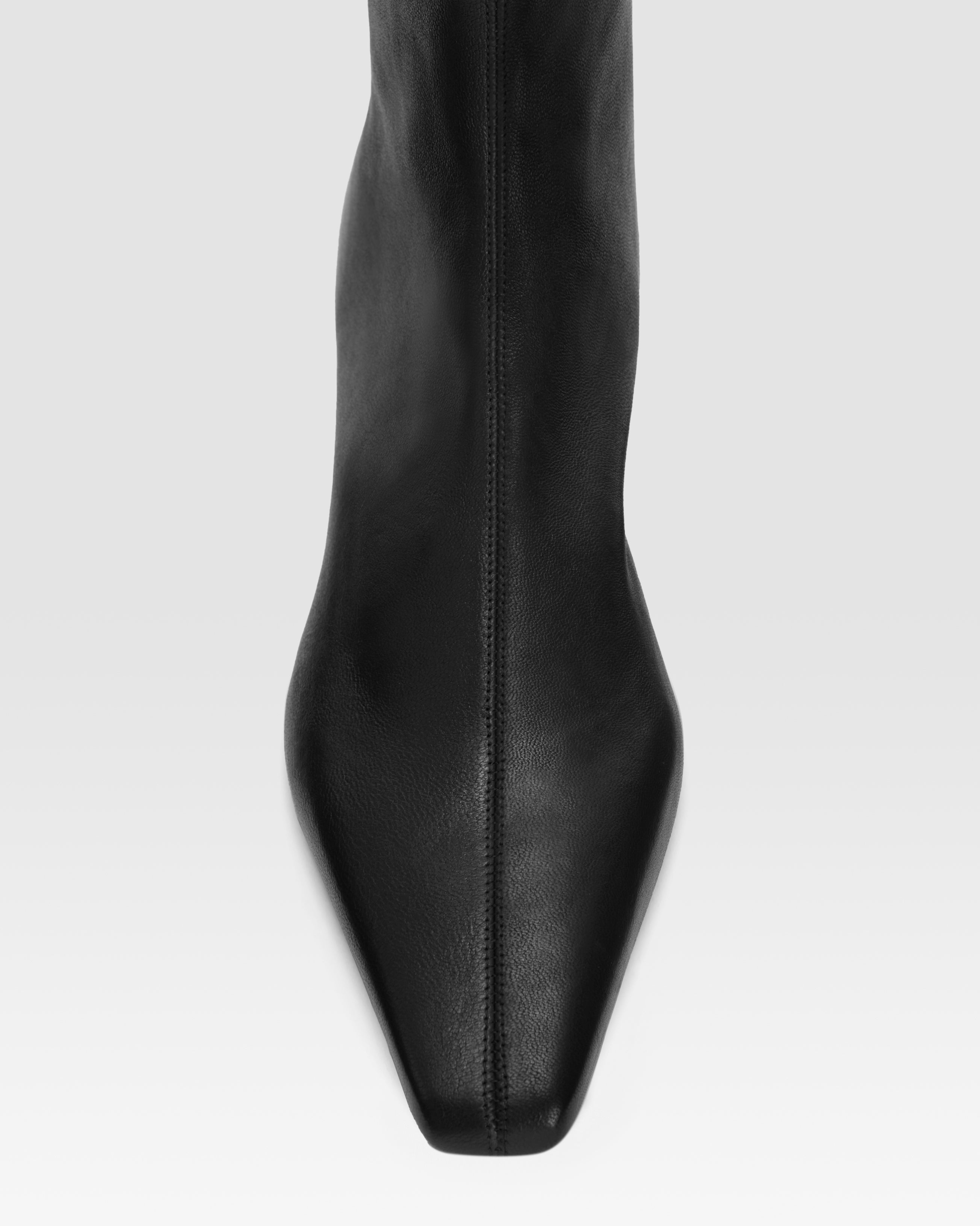 Bottines en cuir stretch noir