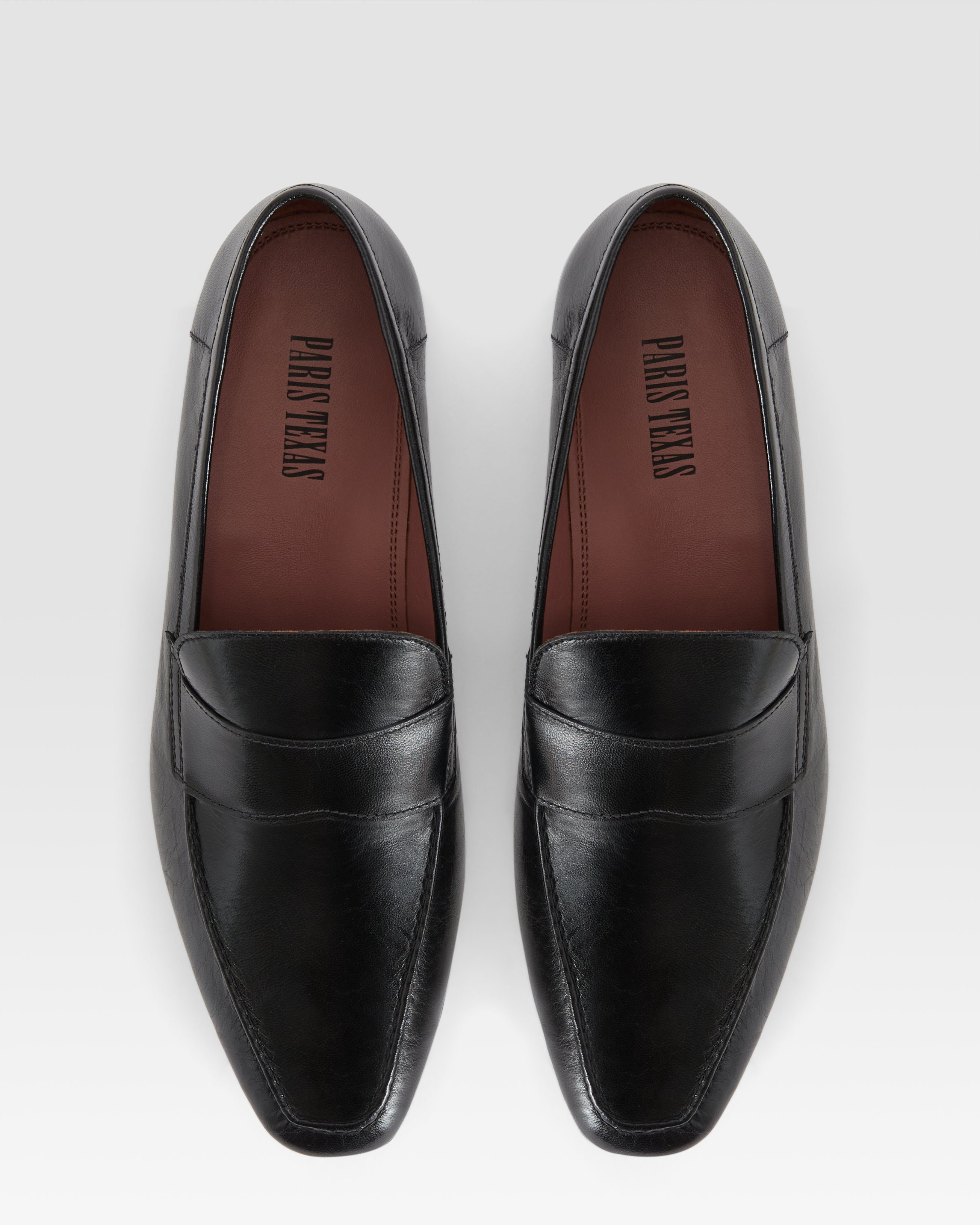 Loafers in shiny black calf leather