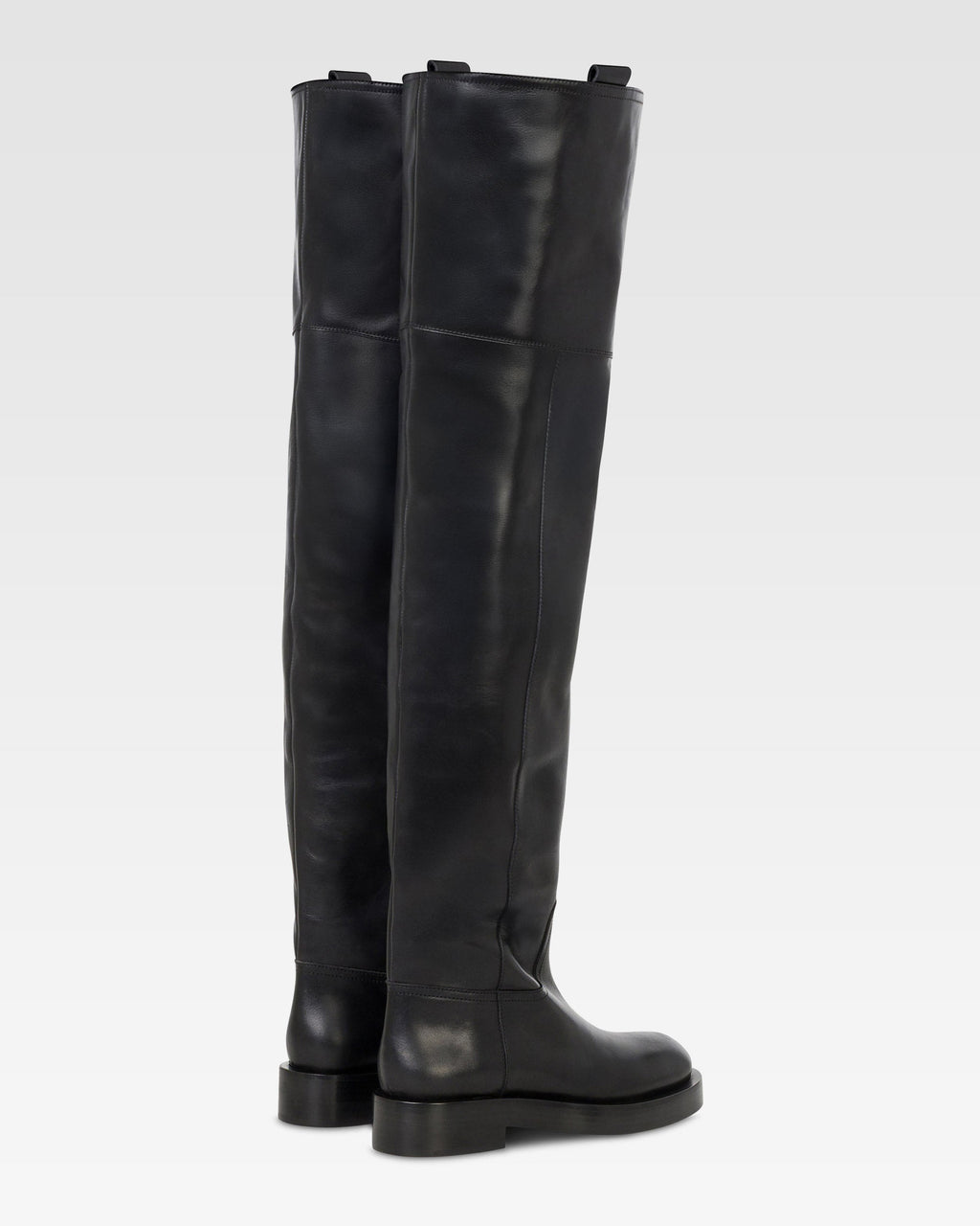 Over-the-knee boots in black calf leather.