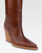 Botas hasta la rodilla de puna fina en piel vintage brillante