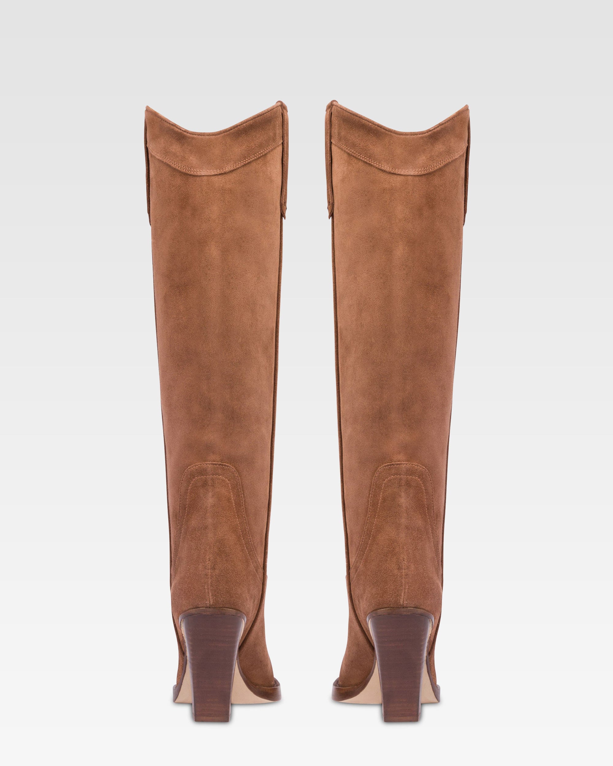 Bottes pointues au genou en cuir lisse marron fonce