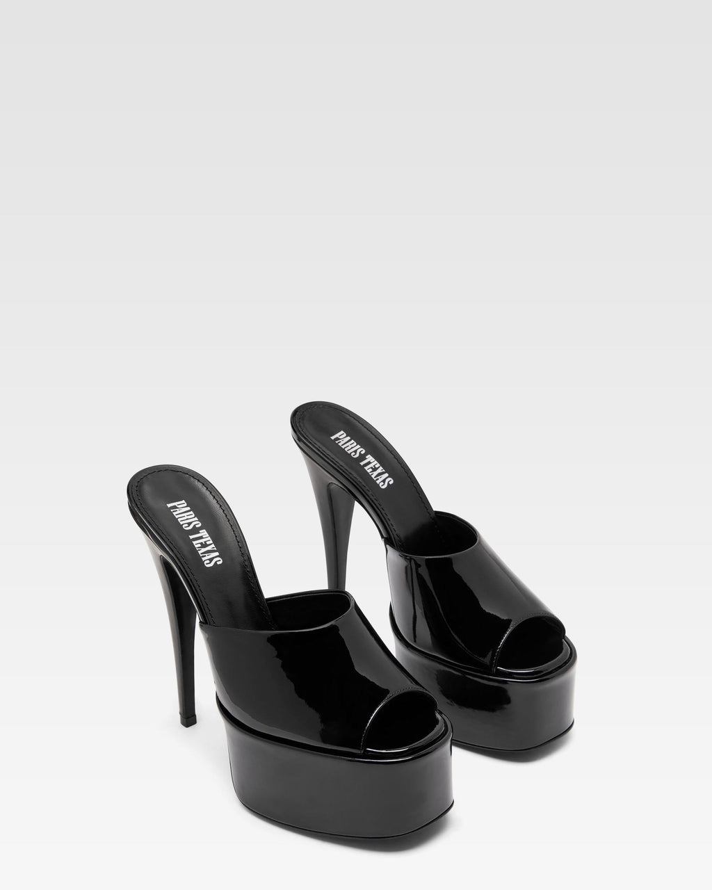 Schwarze Lackleder-Mules mit Plateausohle