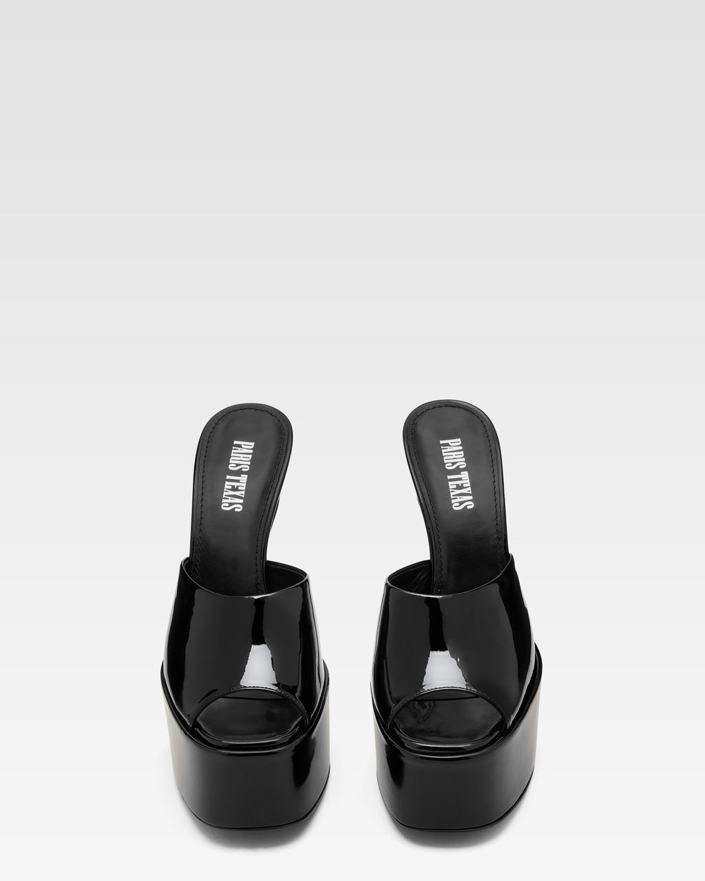 Schwarze Lackleder-Mules mit Plateausohle