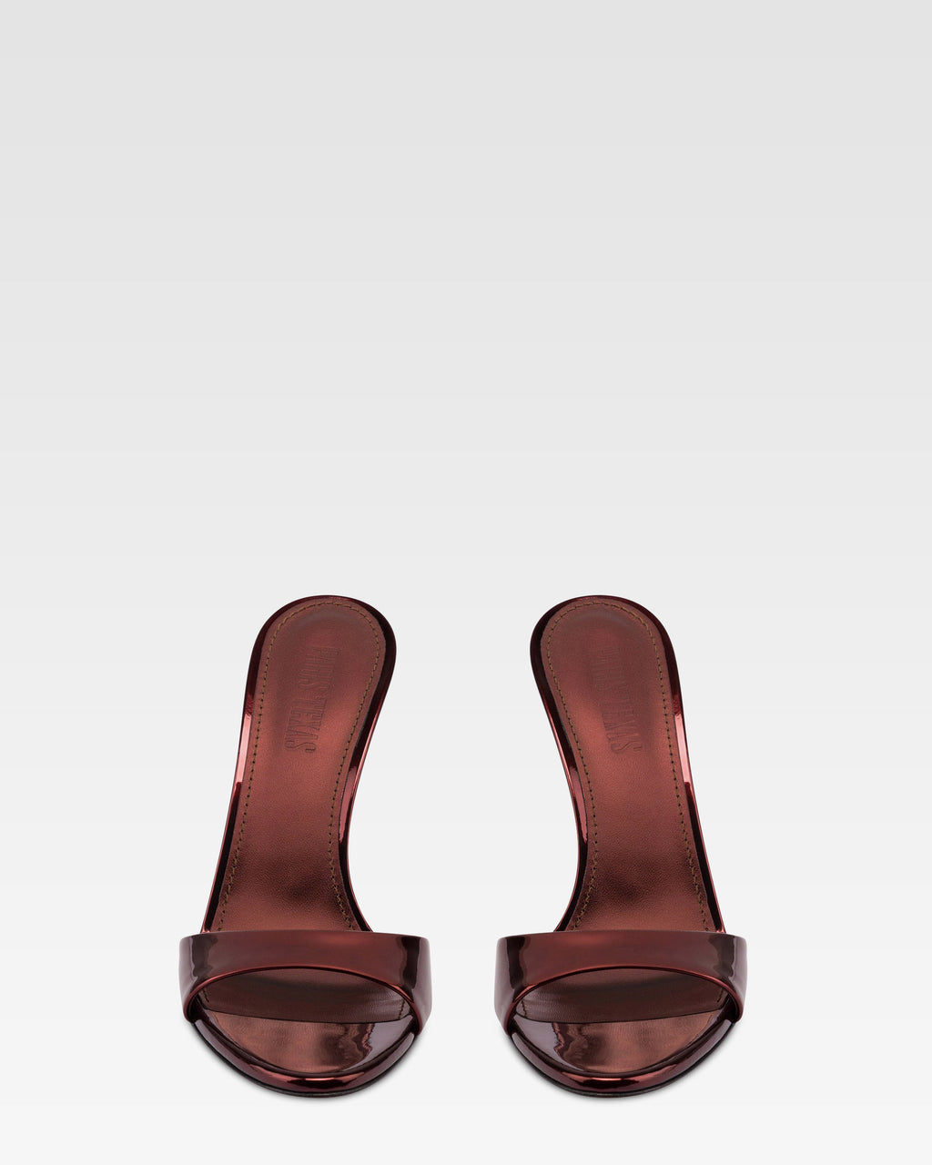 Mules en piel color granate con efecto espejo