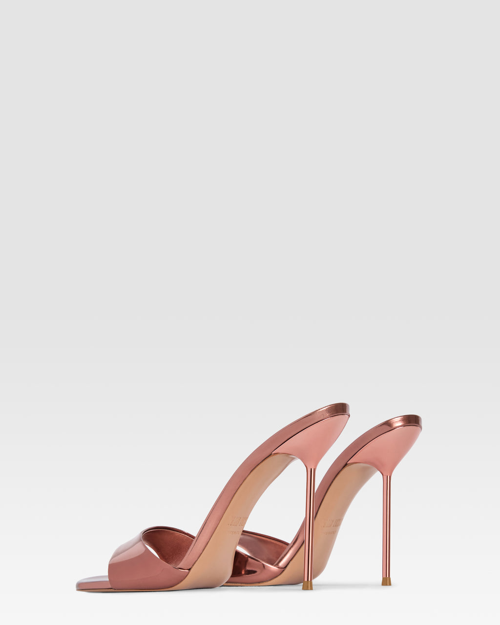 Mules en cuir effet miroir couleur rose du Texas