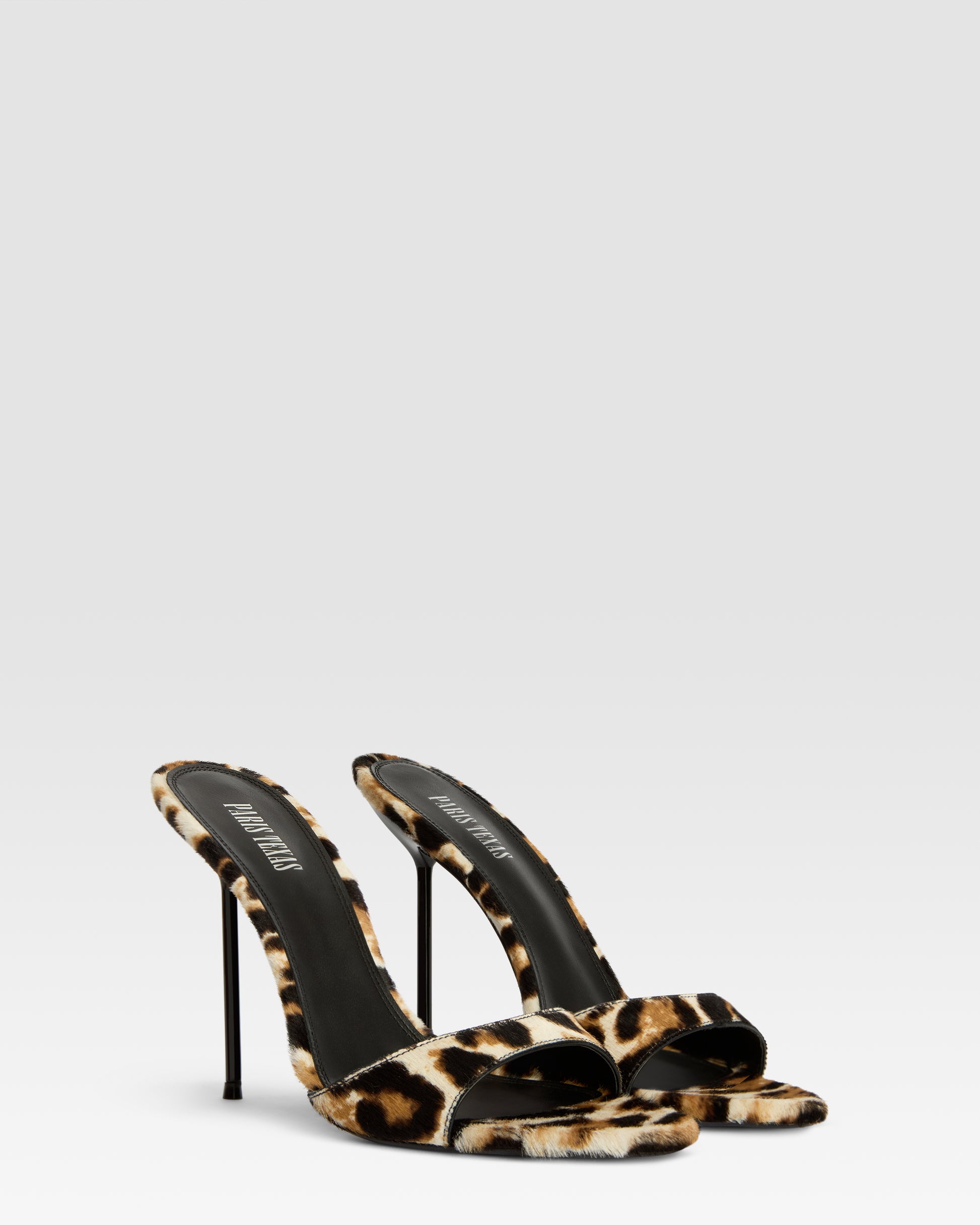 Mules en cuir de vachette a imprime leopard blanc