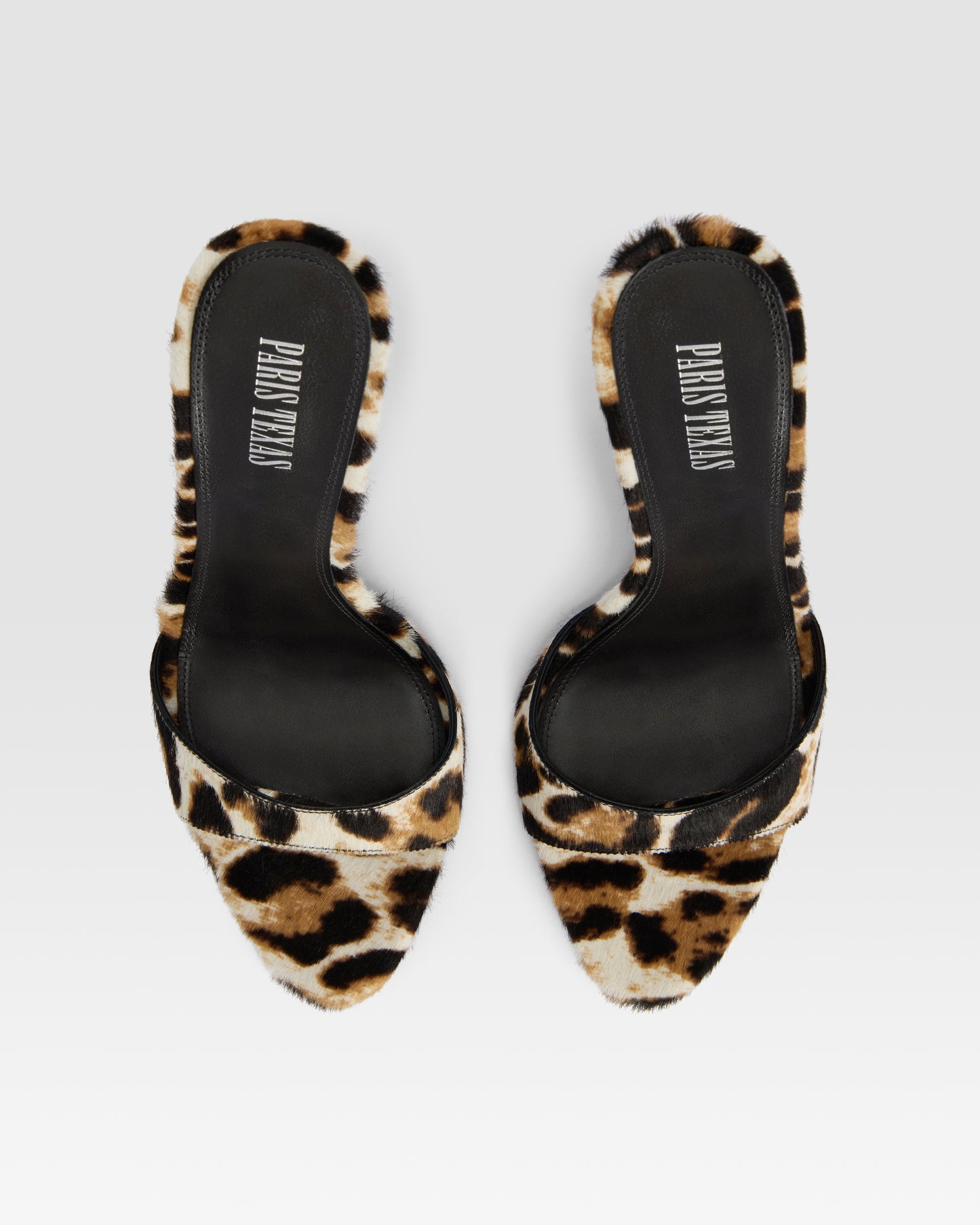 Mules en cuir de vachette a imprime leopard blanc